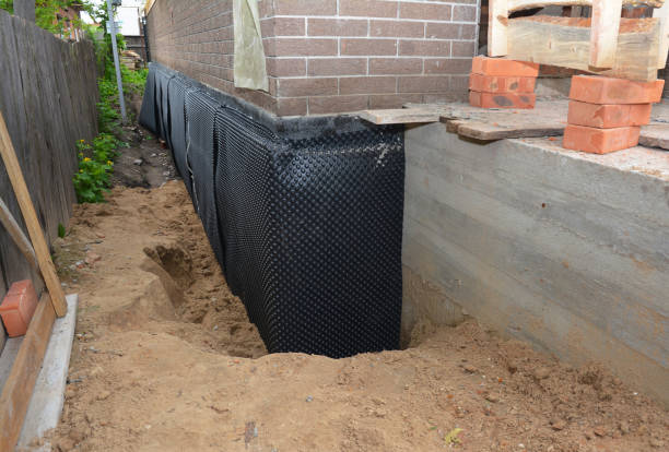 Happy homeowners after waterproofing job in Modoc